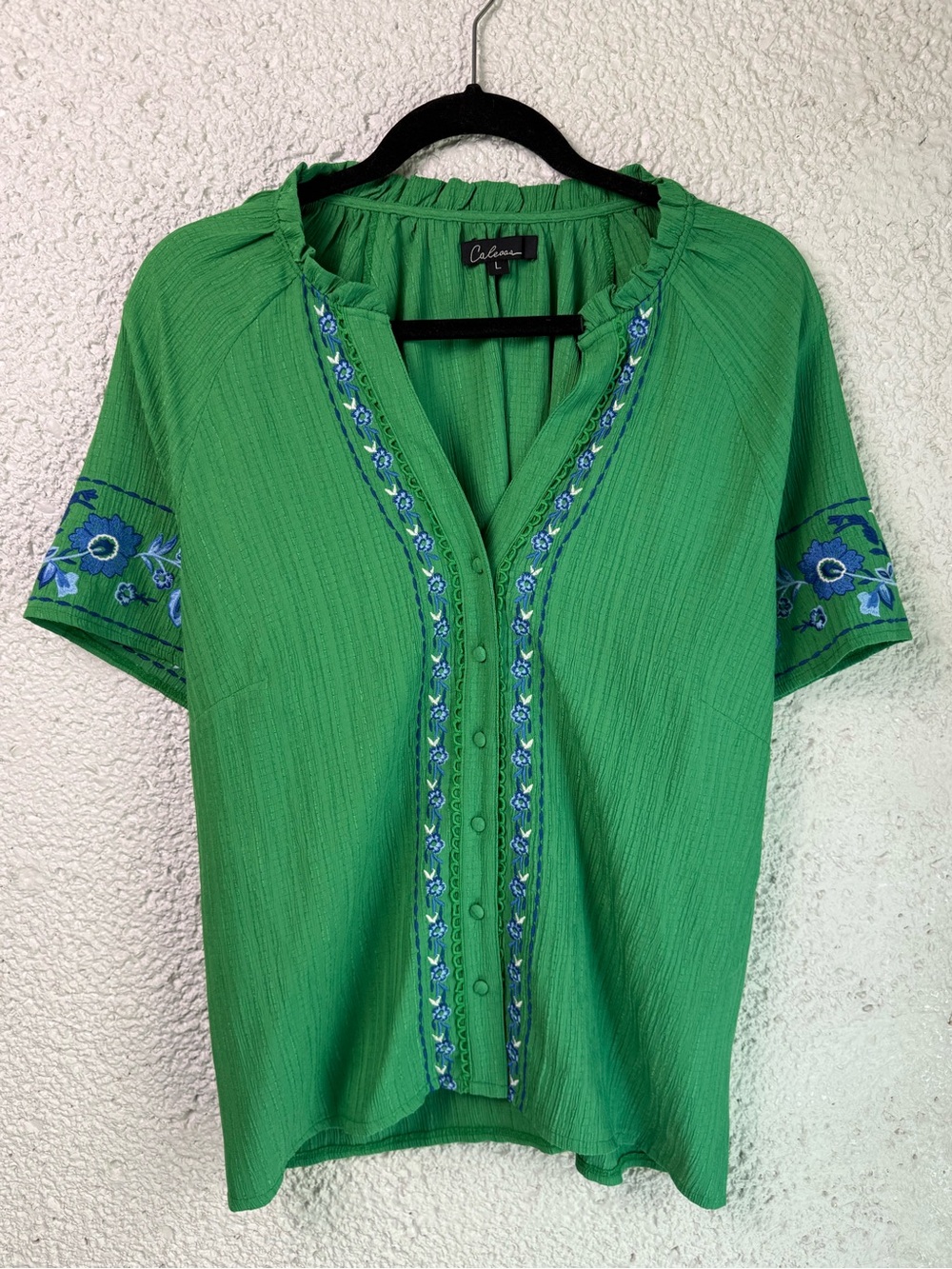 Calea’s Floral Embroidered V-Neck Top